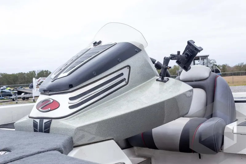 Slide: The Image of 2014 Ranger Z520 Comanche boat console with seating and mounted device holder. - 41