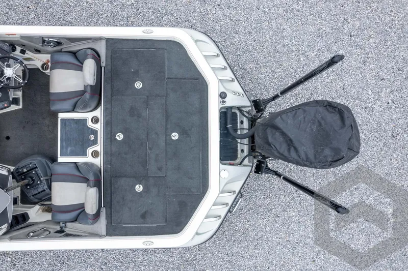 Slide: The Image of Overhead view of 2014 Ranger Z520 Comanche boat interior with seating and storage compartments. - 58