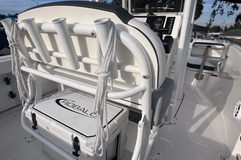 Slide: The Image of 2023 Robalo R222 Explorer boat interior with seating and storage. - 22
