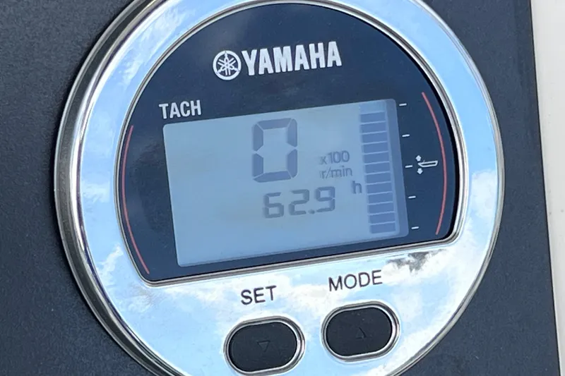 Slide: The Image of Yamaha tachometer displaying 62.9 hours on a 2023 Robalo R222 Explorer boat. - 32