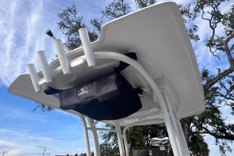 Slide: The Image of 2023 Robalo R222 Explorer T-top with rod holders and storage bag. - 48