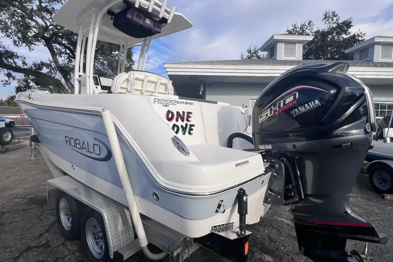 Slide: The Image of 2023 Robalo R222 Explorer boat with Yamaha engine on trailer. - 7