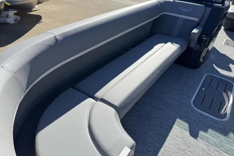 Slide: The Image of 2025 Bennington 26 MSB-ESP boat interior with sleek gray seating and flooring. - 10