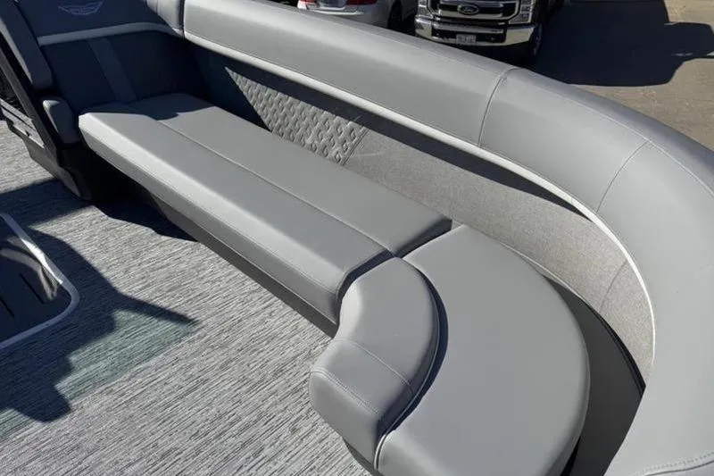Slide: The Image of 2025 Bennington 26 MSB-ESP boat interior with sleek gray seating and modern design. - 13
