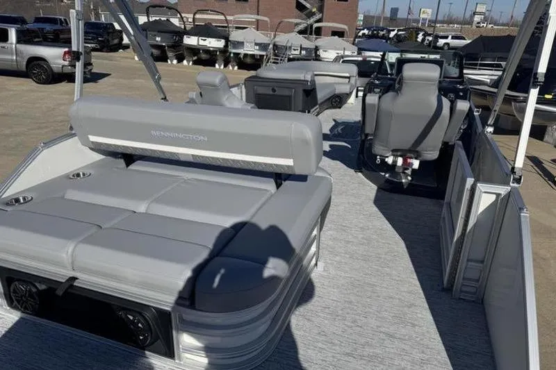 Slide: The Image of 2025 Bennington 26 MSB-ESP pontoon boat with spacious seating and modern design. - 23