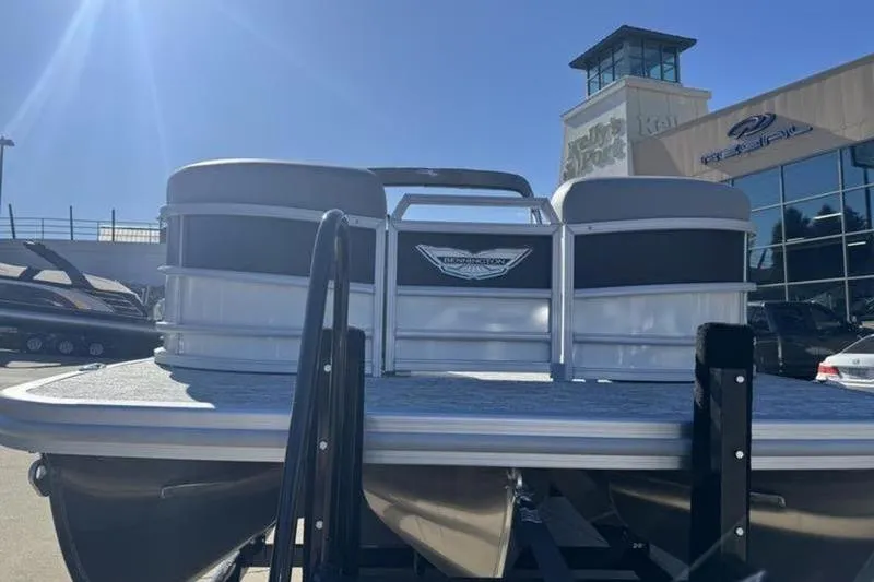 Slide: The Image of 2025 Bennington 26 MSB-ESP pontoon boat displayed at dealership. - 5