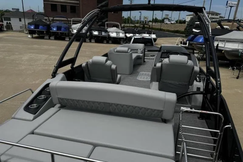 Slide: The Image of 2025 Bennington 26 LXSSBA pontoon boat with luxurious seating and sleek design. - 18