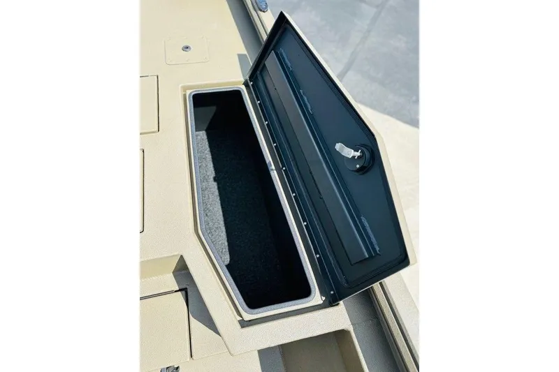 Slide: The Image of Open storage compartment on a 2026 Thor 1900 boat, featuring a secure latch. - 5