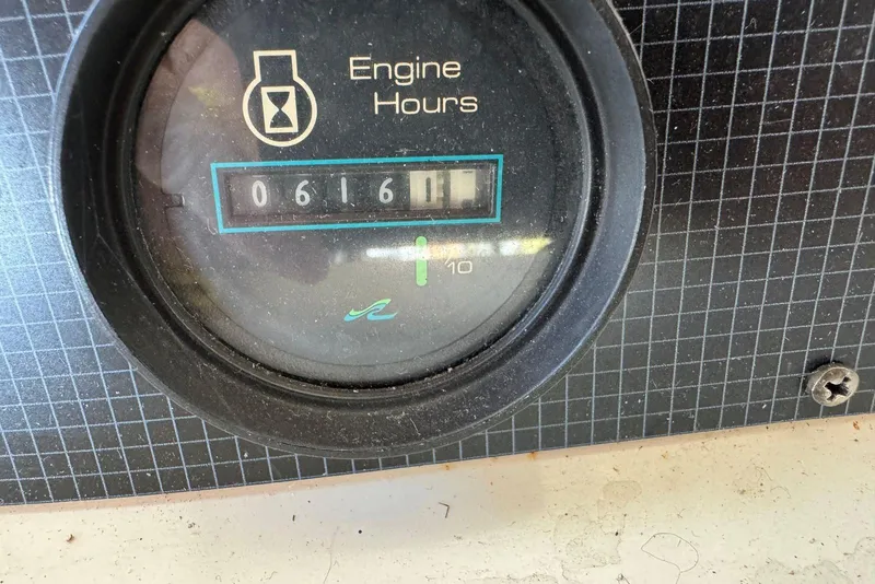 Slide: The Image of Engine hour meter showing 616.1 hours on 1989 Sea Ray 300 Sedan Bridge. - 15