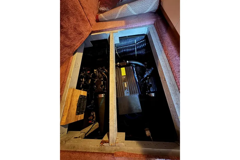 Slide: The Image of Engine compartment of a 1989 Sea Ray 300 Sedan Bridge boat. - 37