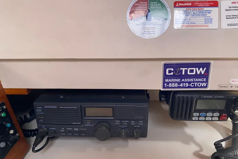 Slide: The Image of Marine radio equipment on a 1995 Sundeer 56 with CTOW assistance sticker. - 14