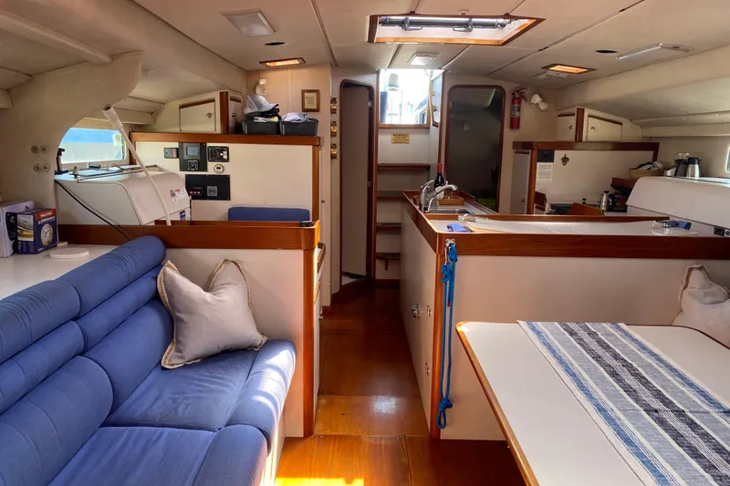Slide: The Image of Interior of a 1995 Sundeer 56 yacht with cozy seating and modern amenities. - 21