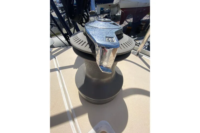 Slide: The Image of Sundeer 56 sailboat winch, 1995 model, in sunlight on deck. - 41