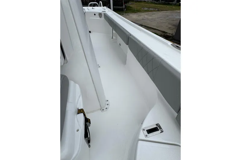Slide: The Image of 2026 Blazer Bay 2440 boat interior with sleek white and gray design. - 16