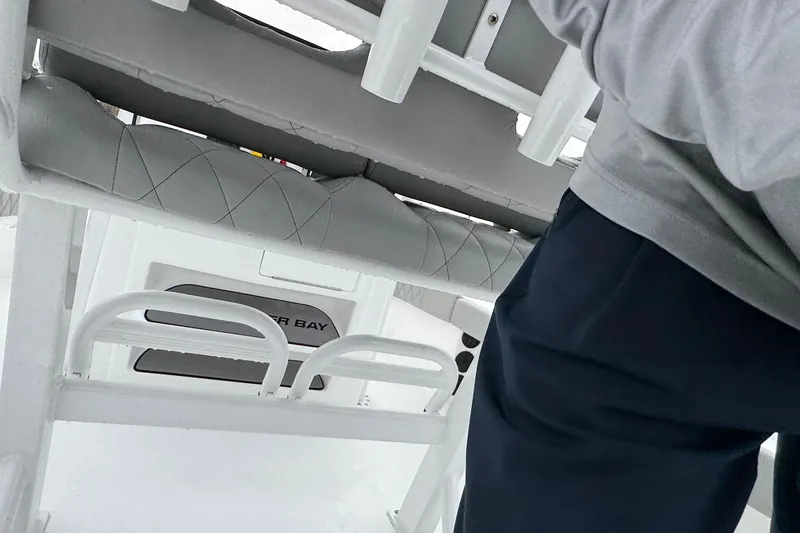 Slide: The Image of Interior view of a 2026 Blazer Bay 2440 boat, featuring seating and storage. - 29