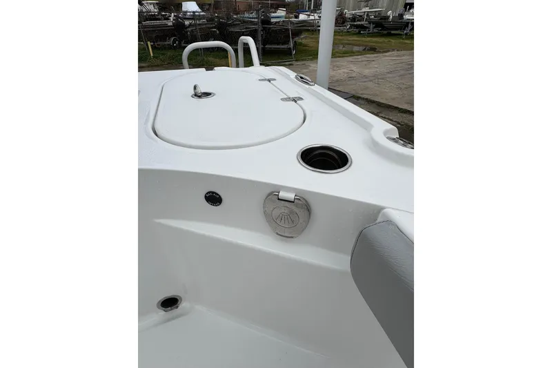 Slide: The Image of 2026 Blazer Bay 2440 boat deck with storage compartment and seating. - 32