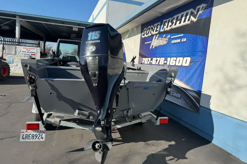 Slide: The Image of 2017 RH Boats 18 SH with Tohatsu 115 engine at dealership. - 6