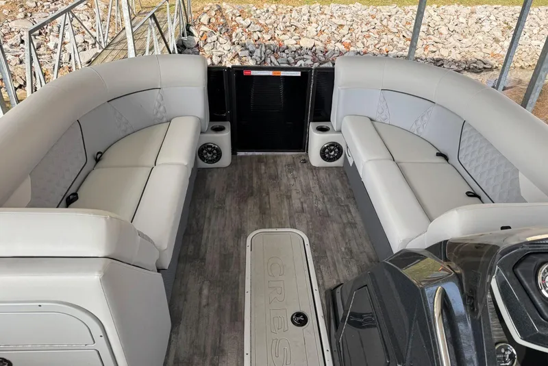 Slide: The Image of Interior of 2022 Crest Classic Platinum 220 SLRC pontoon boat with plush seating. - 20