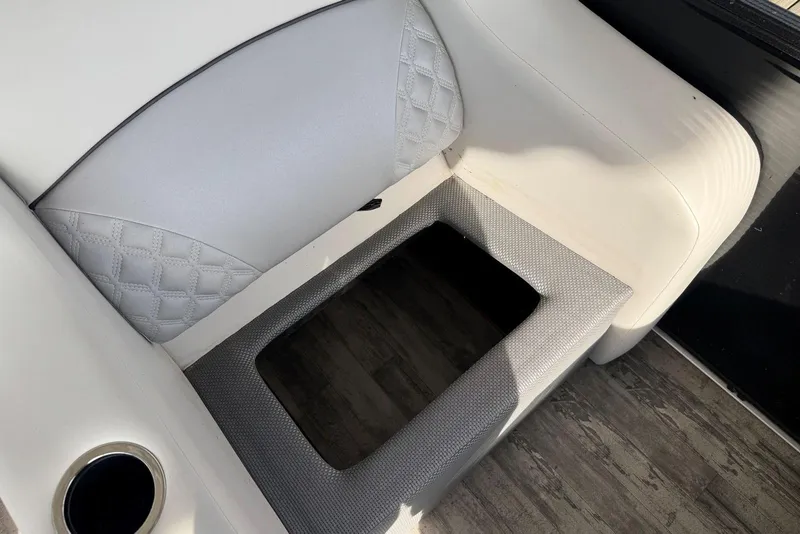 Slide: The Image of White and gray seating area on 2022 Crest Classic Platinum 220 SLRC boat. - 24