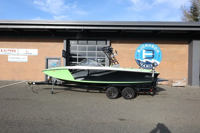 The Image of 2016 Tigé R22 boat on trailer at Bjornson Marine dealership. - 1