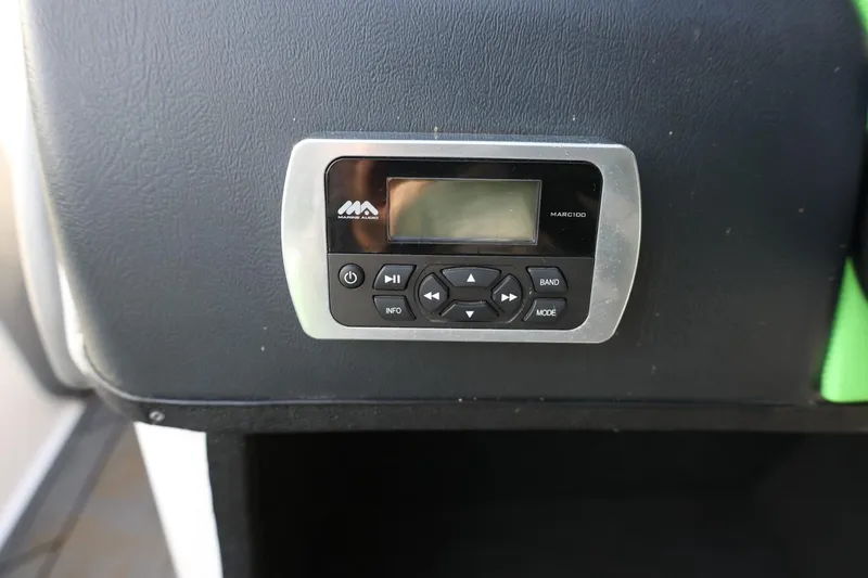 Slide: The Image of Marine audio control panel in 2016 Tigé R22 boat interior. - 23