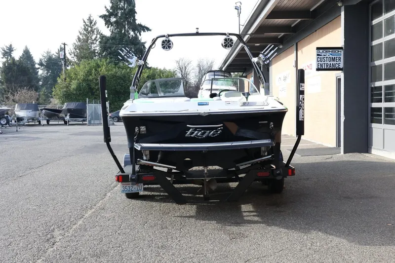 Slide: The Image of 2016 Tigé R22 boat on trailer outside dealership, rear view. - 7