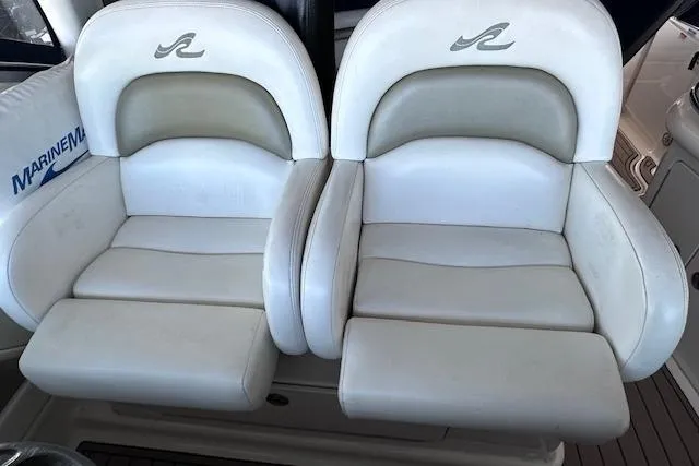 Slide: The Image of Luxury seating on 2007 Sea Ray 340 Sundancer boat, featuring plush white upholstery. - 12