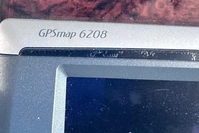 Slide: The Image of Close-up of GPSmap 6208 on 2007 Sea Ray 340 Sundancer dashboard. - 15