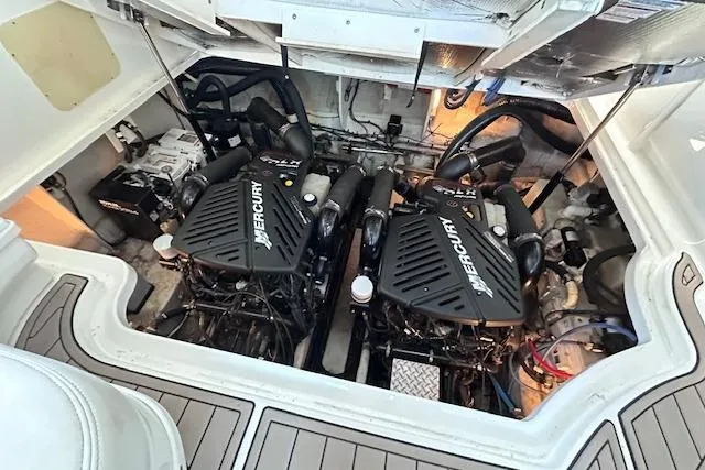 Slide: The Image of Engine compartment of 2007 Sea Ray 340 Sundancer with twin Mercury engines. - 25