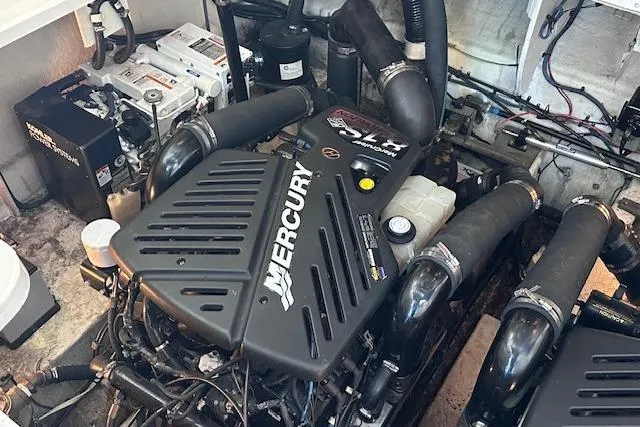 Slide: The Image of Engine room of 2007 Sea Ray 340 Sundancer with Mercury engine components. - 26