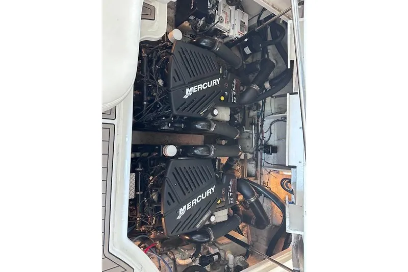 Slide: The Image of Engine compartment of a 2007 Sea Ray 340 Sundancer with twin Mercury engines. - 29