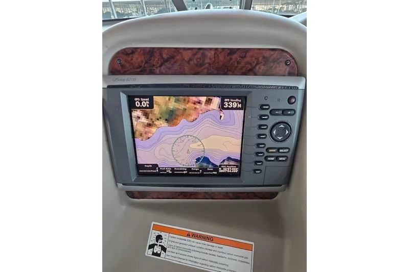 Slide: The Image of GPS navigation system on 2007 Sea Ray 340 Sundancer boat dashboard. - 37