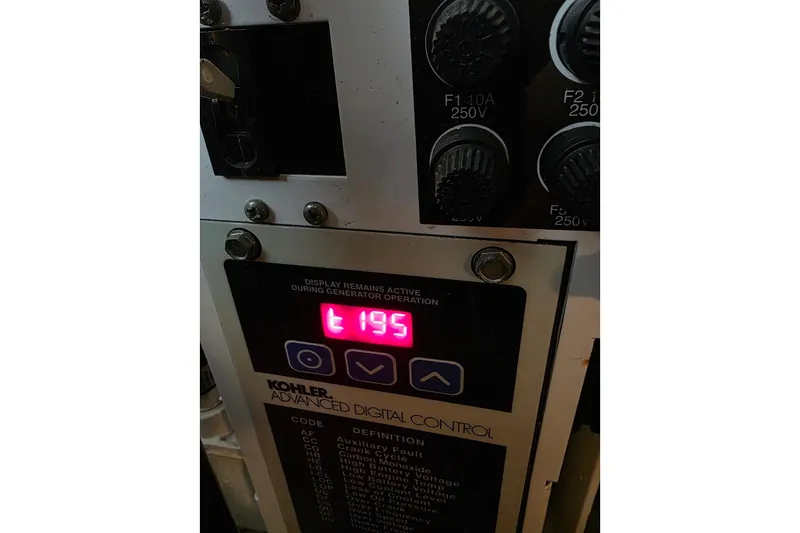 Slide: The Image of Kohler advanced digital control panel on 2007 Sea Ray 340 Sundancer boat. - 43