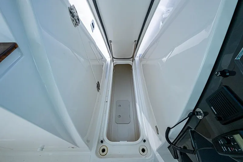 Slide: The Image of 2022 Tiara Yachts 34 LX interior with luxurious seating and ocean view. - 29