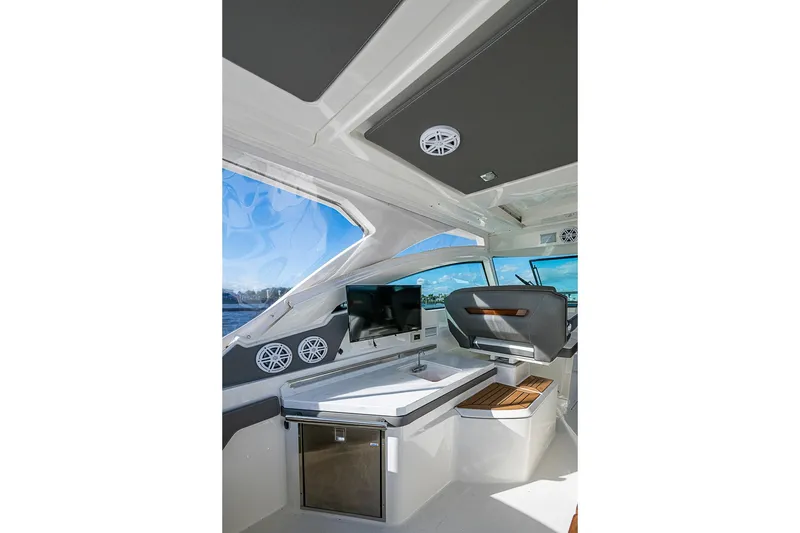 Slide: The Image of Interior of 2022 Tiara Yachts 34 LX, featuring modern amenities and sleek design. - 31