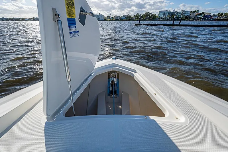 Slide: The Image of 2022 Tiara Yachts 34 LX boat interior with spacious seating and ocean view. - 47