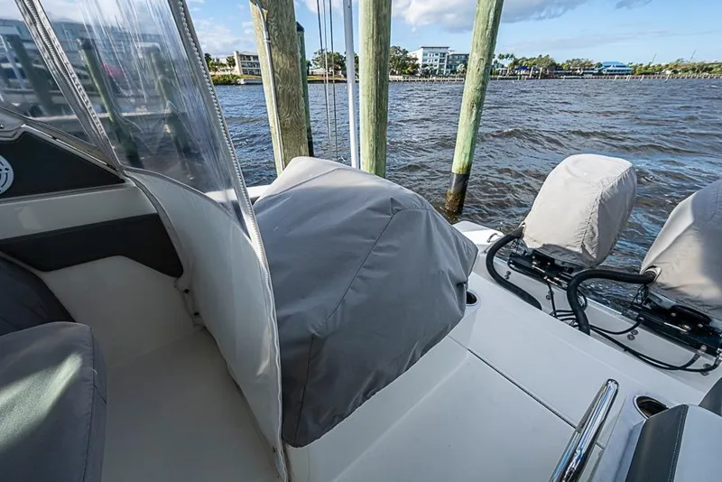 Slide: The Image of Interior of 2022 Tiara Yachts 34 LX, featuring modern seating and sleek design. - 55