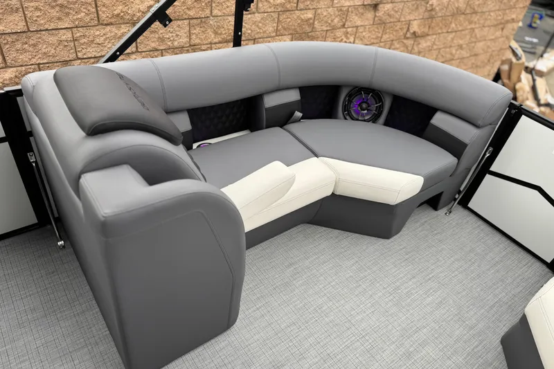 Slide: The Image of Luxurious seating in 2026 Berkshire 21CL STS pontoon boat with modern design and speaker system. - 12