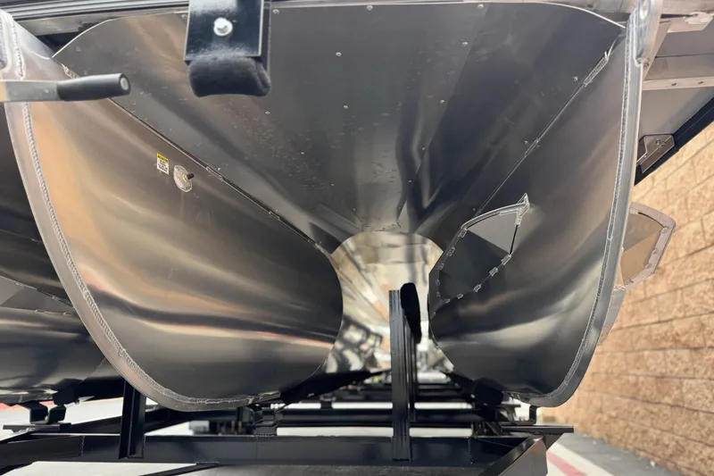 Slide: The Image of Underneath view of a 2026 Berkshire 21CL STS pontoon boat, showcasing sleek aluminum construction. - 4