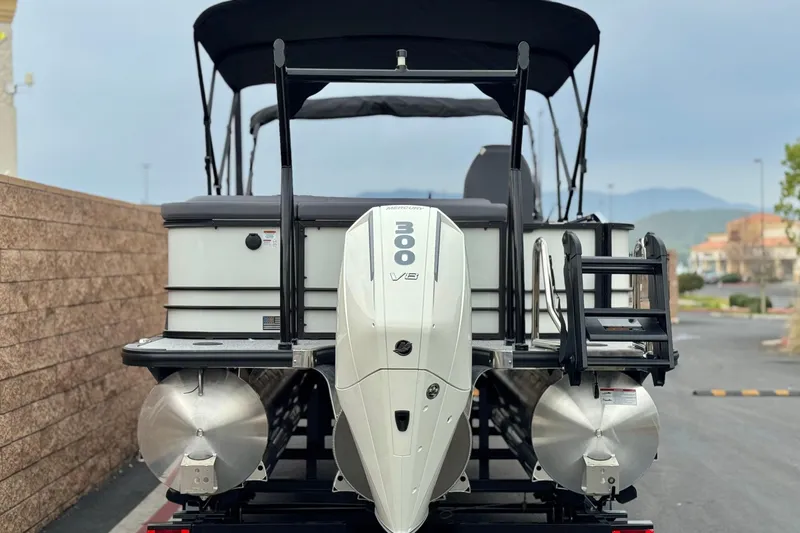 Slide: The Image of 2026 Berkshire 21CL STS pontoon boat with 300 V8 engine, rear view. - 5