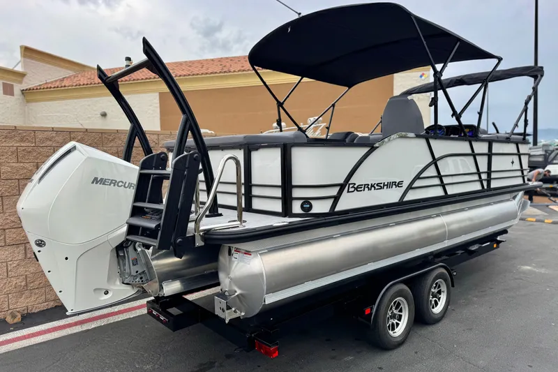 Slide: The Image of 2026 Berkshire 21CL STS pontoon boat with Mercury engine on trailer. - 6