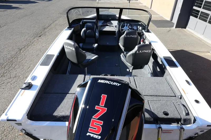 Slide: The Image of 2026 Lund 1875 Crossover XS boat with Mercury 175 Pro engine, interior view. - 11