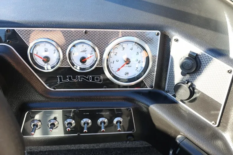 Slide: The Image of Dashboard of 2026 Lund 1875 Crossover XS boat with gauges and controls. - 25