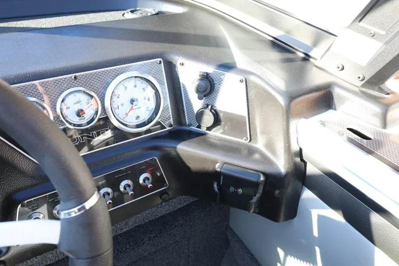 Slide: The Image of Dashboard of 2026 Lund 1875 Crossover XS boat with gauges and controls. - 27