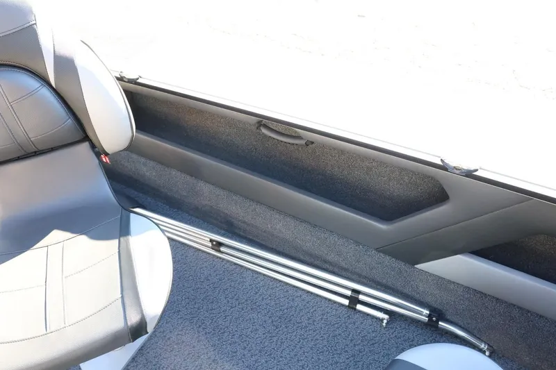 Slide: The Image of 2026 Lund 1875 Crossover XS interior with seating and storage features. - 36