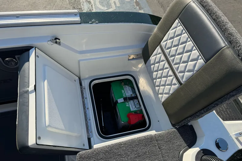 Slide: The Image of 2026 Ranger 620xFS Pro boat seat with storage compartment and battery. - 10