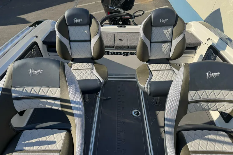 Slide: The Image of 2026 Ranger 620xFS Pro boat interior with four stylish, cushioned seats. - 8