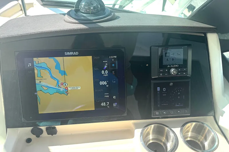 Slide: The Image of 2023 Boston Whaler 240 Vantage boat side view with logo in sunlight. - 16