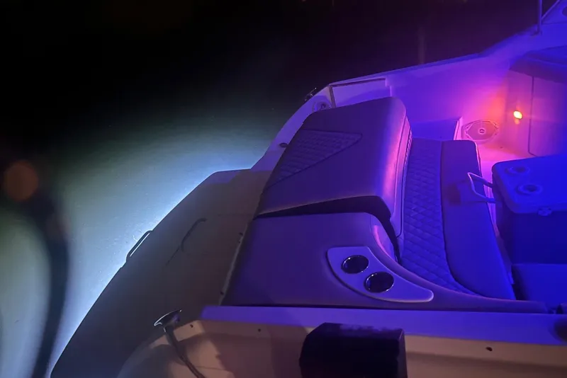 Slide: The Image of 2006 Formula 330 Sun Sport boat interior with ambient purple lighting. - 17