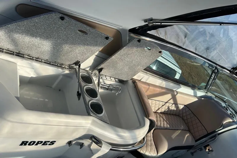 Slide: The Image of Interior of a 2006 Formula 330 Sun Sport boat with seating and storage compartments. - 8